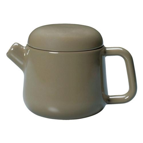 TRAPE Grune Porzellan-Teekanne Teegeschirr auf weissen Hintergrund - TRAPE green teapot Teaware Kinto on white background